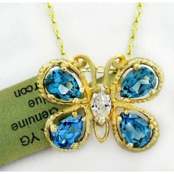 Genuine 3.36 Cts Blue Zircon & White Sapphire Butterfly  Genuine 3.36 Cts Blue Zircon & White Sapphire Butterfly Pendant 10k Gold
